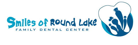 Smiles of Round Lake, Family Dental Center. A tooth enclosing a family of four.